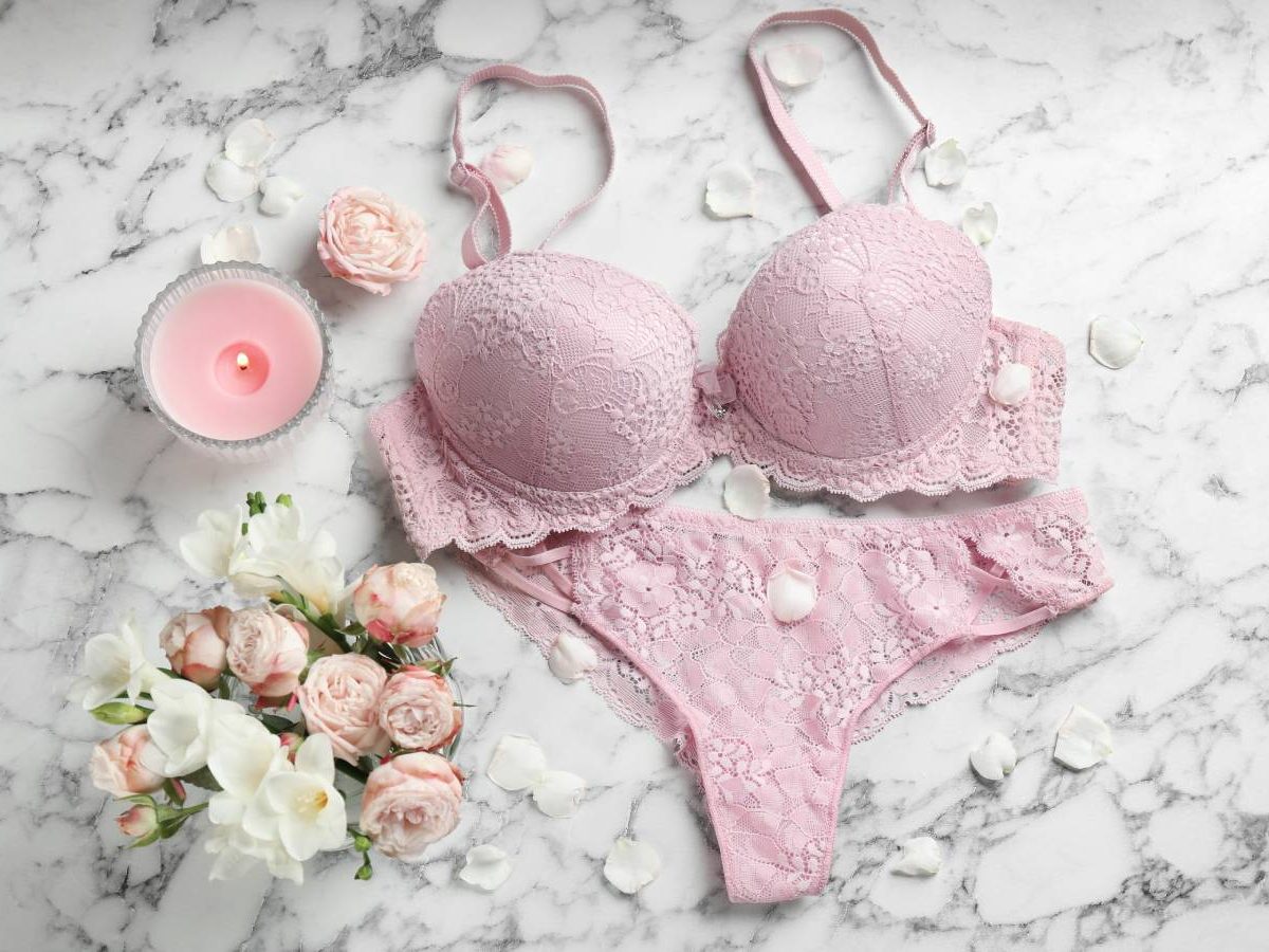 pink-lingerie-set-and-flowers-on-marble-surface-2026-03-26-23-59-22-utc
